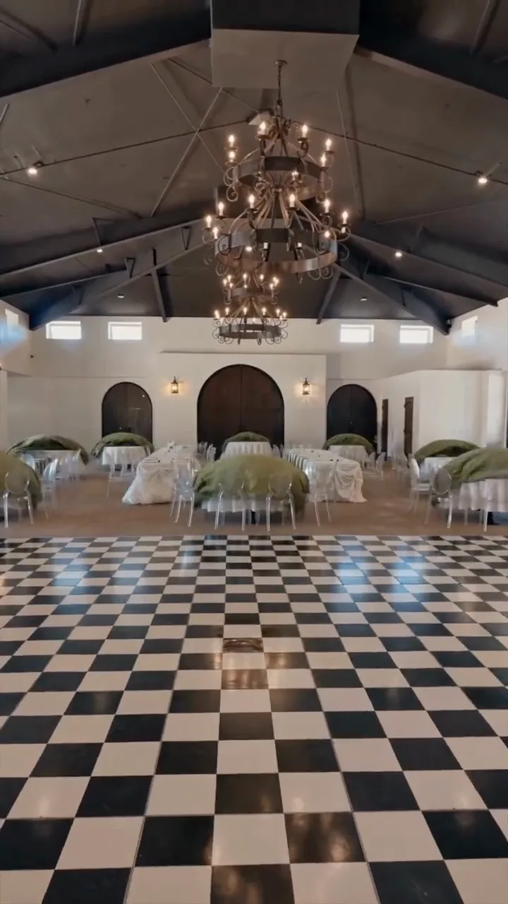 An empty ballroom before it is dressed for a wedding