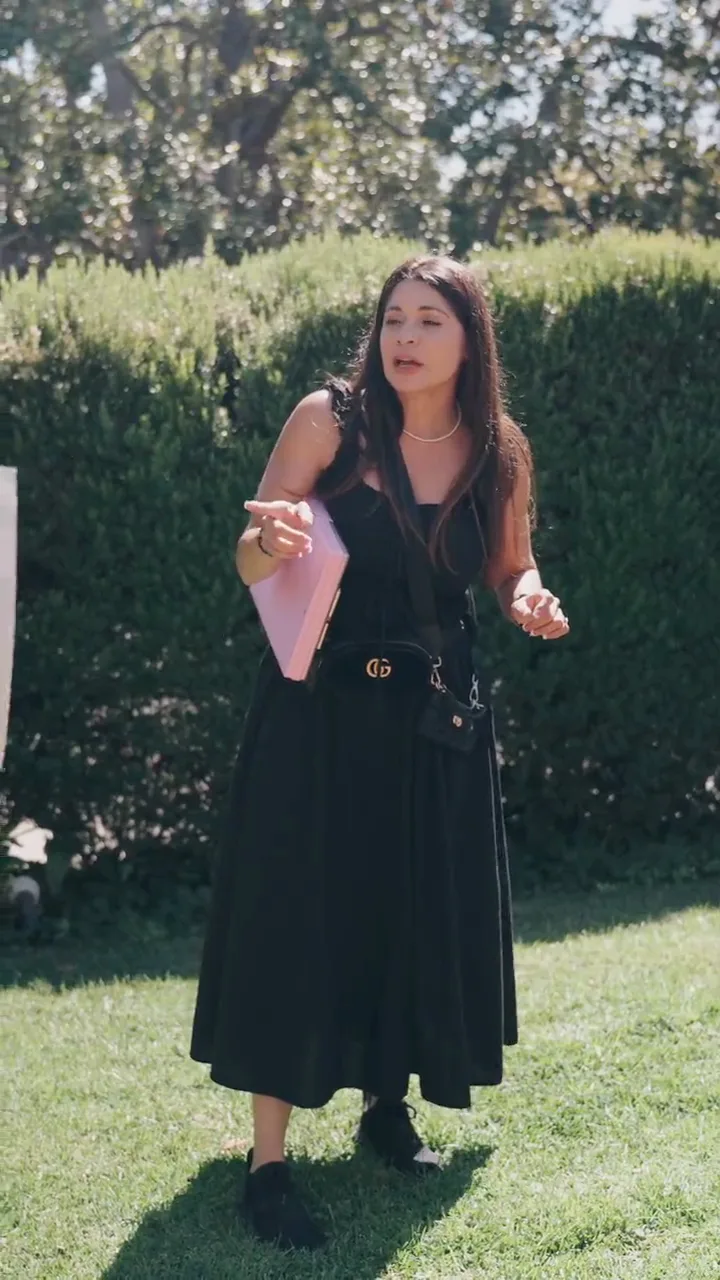 A wedding planner working with a folder in hand