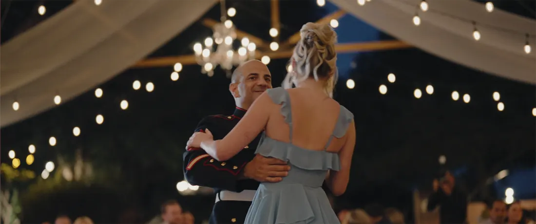 First dance under string lights at Maravilla Gardens after dark